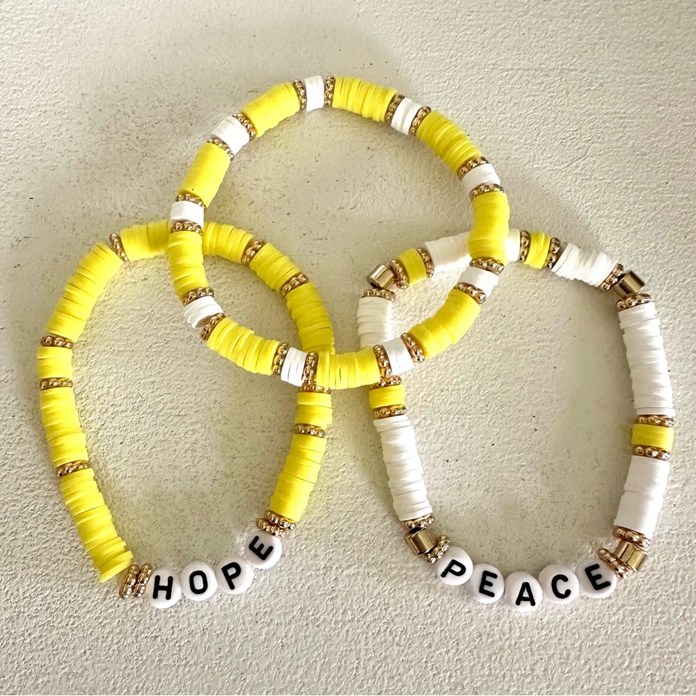 Yellow and White Beaded Bracelets